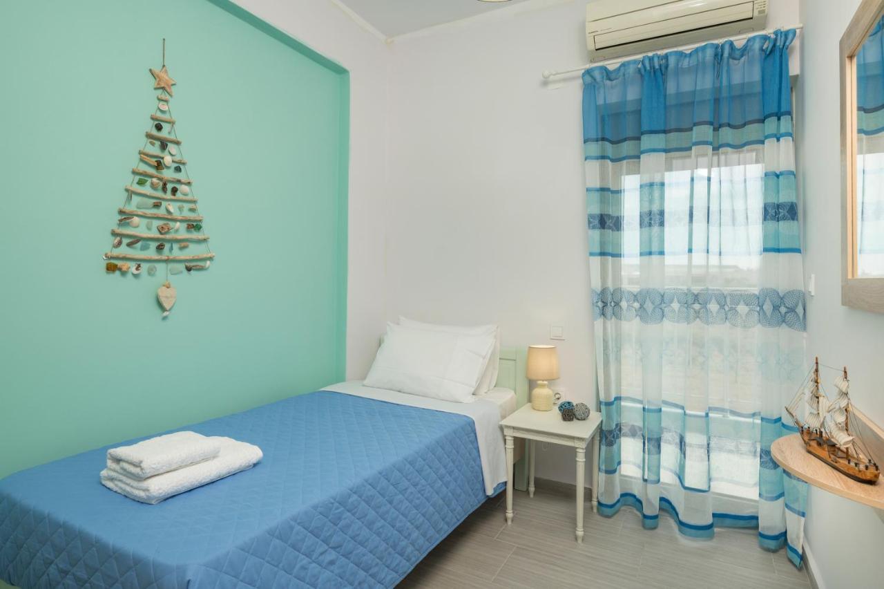 Sea Breeze Apartments Колимварион Экстерьер фото
